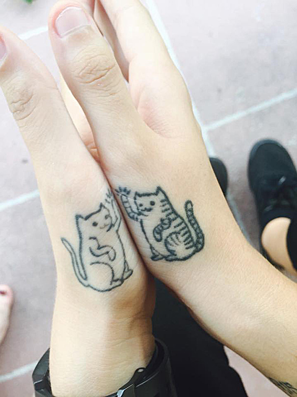 minimalistic-cat-tattoo-53__605-58065736eaaab__605