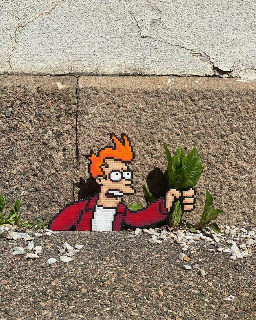 Artist ‘Vandalizes’ The Streets With His Fun And Unique Pixel Art (30 Pics)