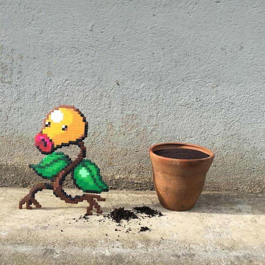 Artist ‘Vandalizes’ The Streets With His Fun And Unique Pixel Art (30 Pics)