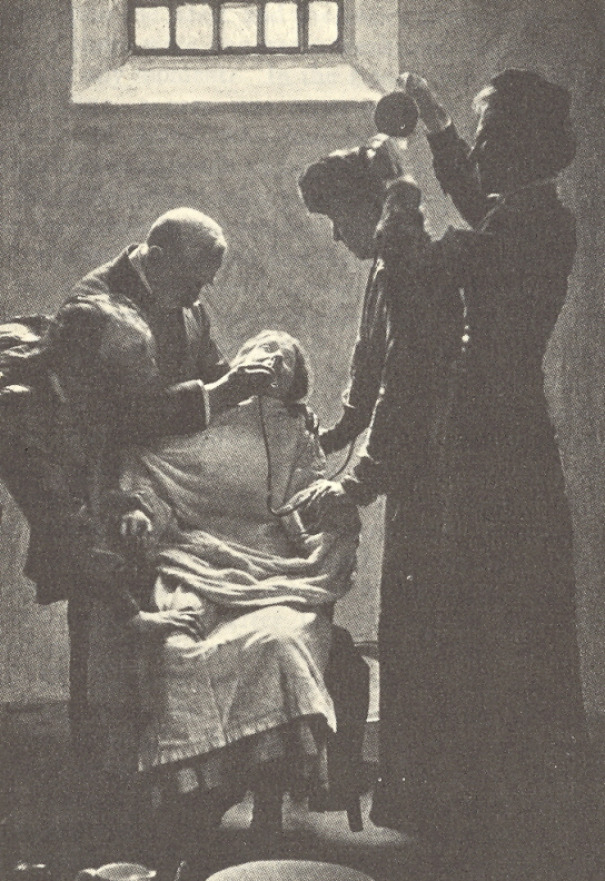 une suffragette est nourrie de force dans la prison hm holloway au royaume-uni pendant les grèves de la faim pour le suffrage des femmes, vers 1911