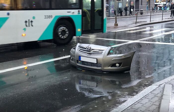 This Picture Of A Car Bumper Taken After A Car Crash Looks Like It Belongs To The Car Coming From Another Dimension