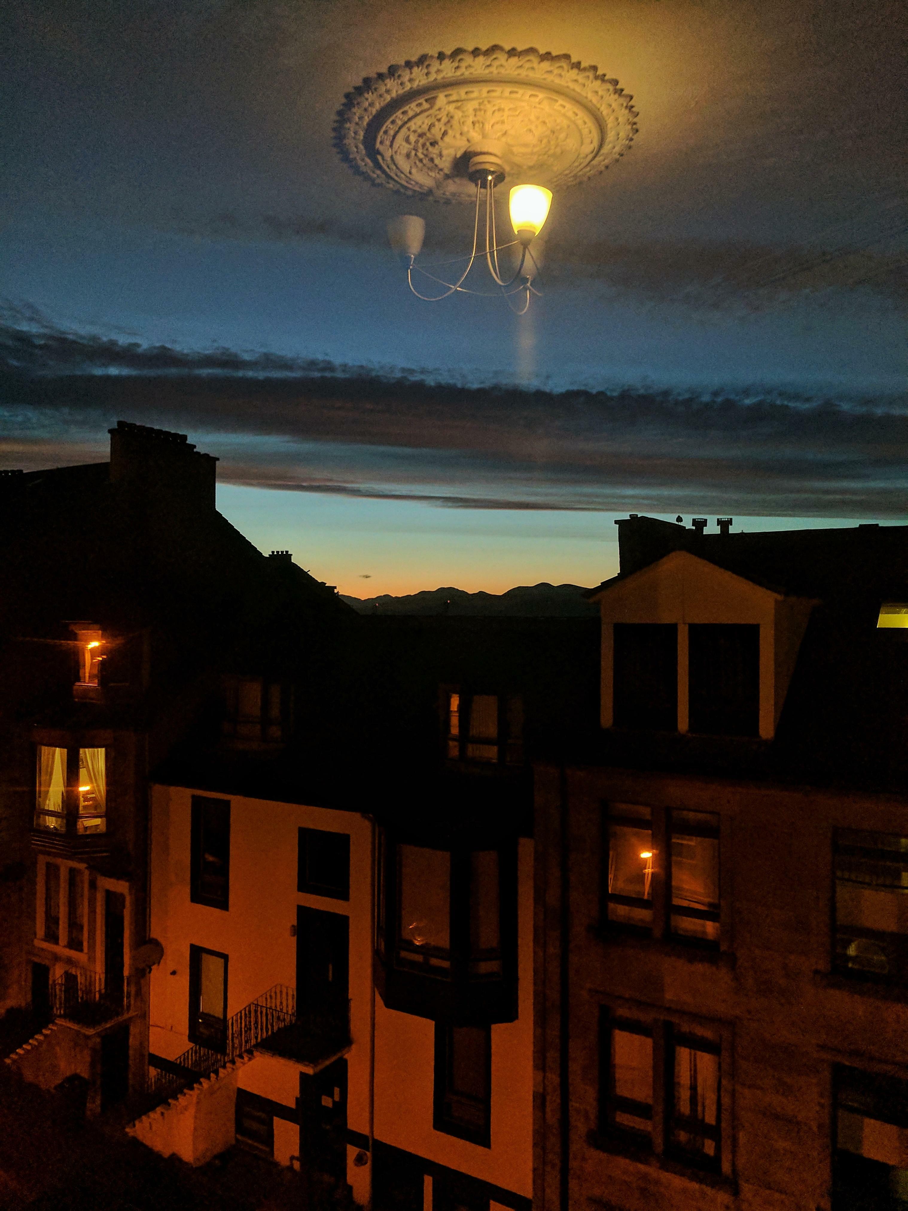 Caught The Reflection Of The Light In The Window, Looks Like It's Floating In The Sky