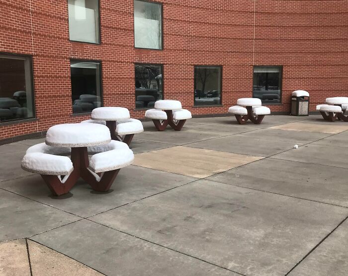 The Ground Is Heated Around The Building I Work In, Making These Snowy Tables Look Out Of Place