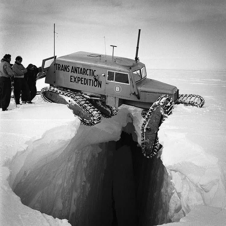A Vehicle Hovering Over A Crevasse During The Trans-Aantarctic Expedition Of 1954