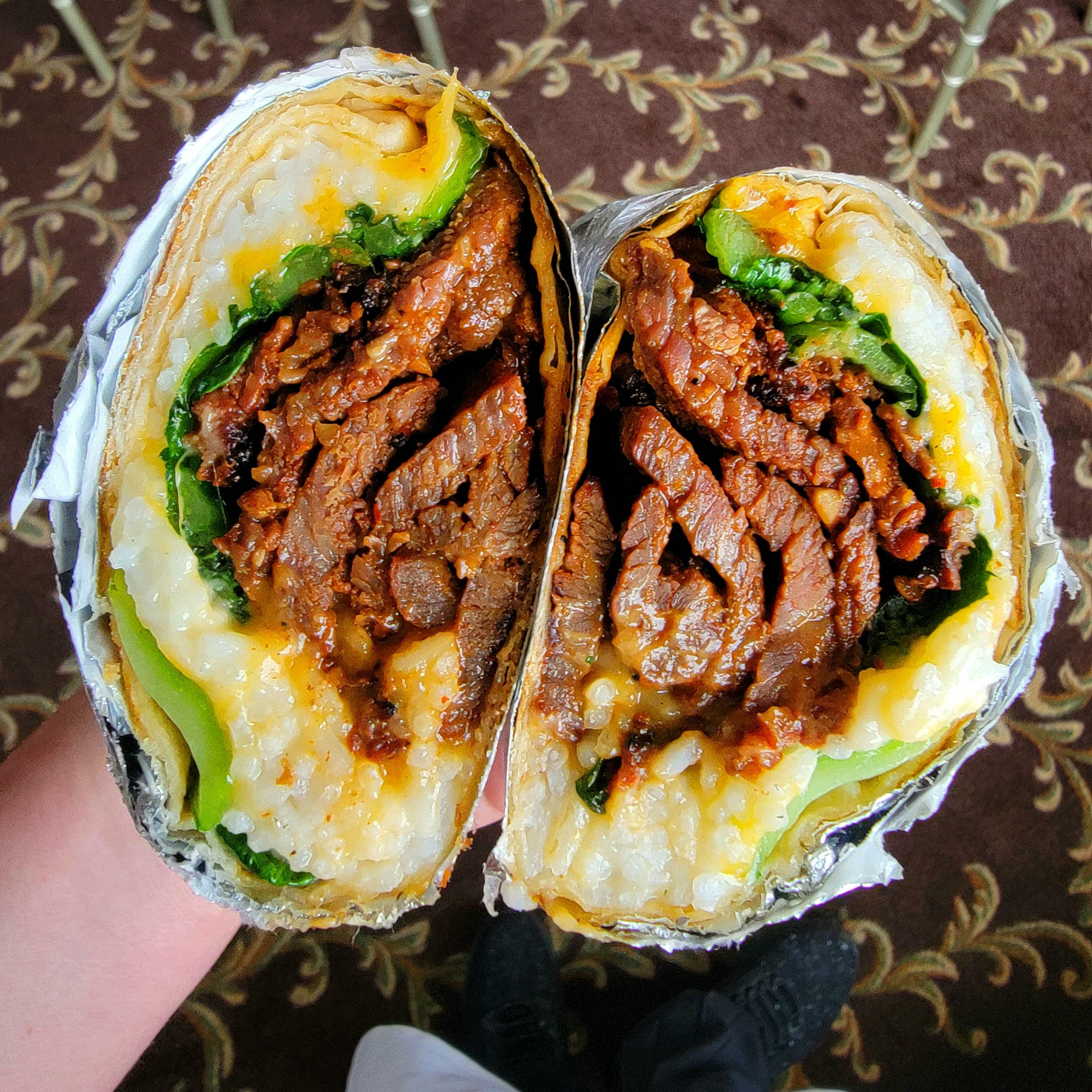Bulgogi Burrito With Bok Choy, Rice, And Cheese. We Call It The