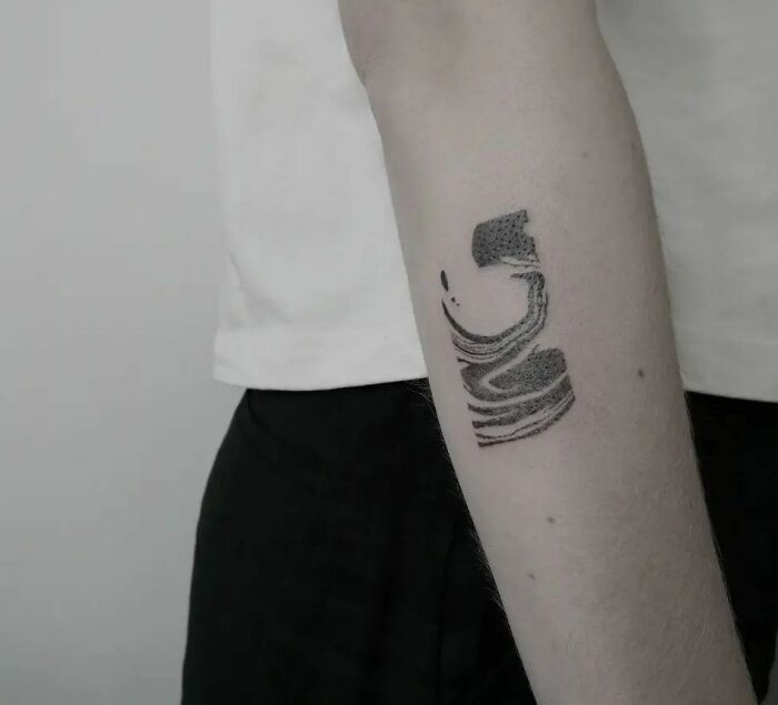 tatouage abstrait sur le bras
