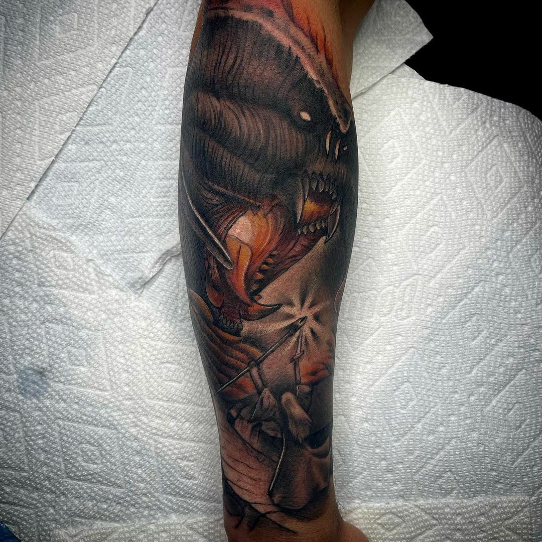 tatouage de gandalf et balrog