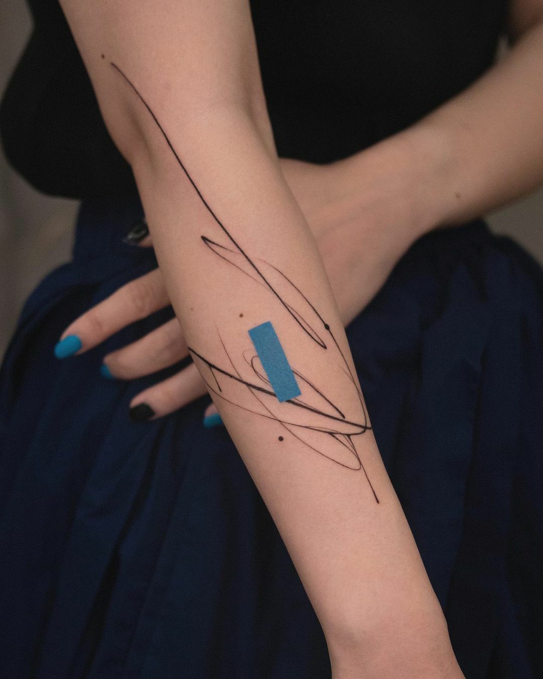 zima blue abstract tattoo