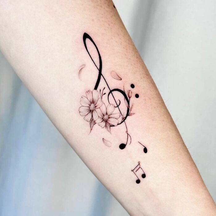 Tatouage de musique délicate